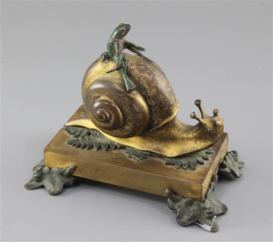 A 19th century French bronze and ormolu timepiece, height 5.5in. width 6.25in.
